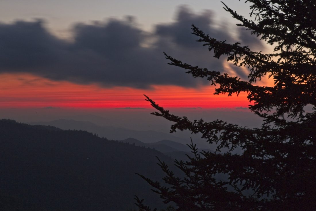 Warm sunset light over silhouetted Blue Ridge ridgelines